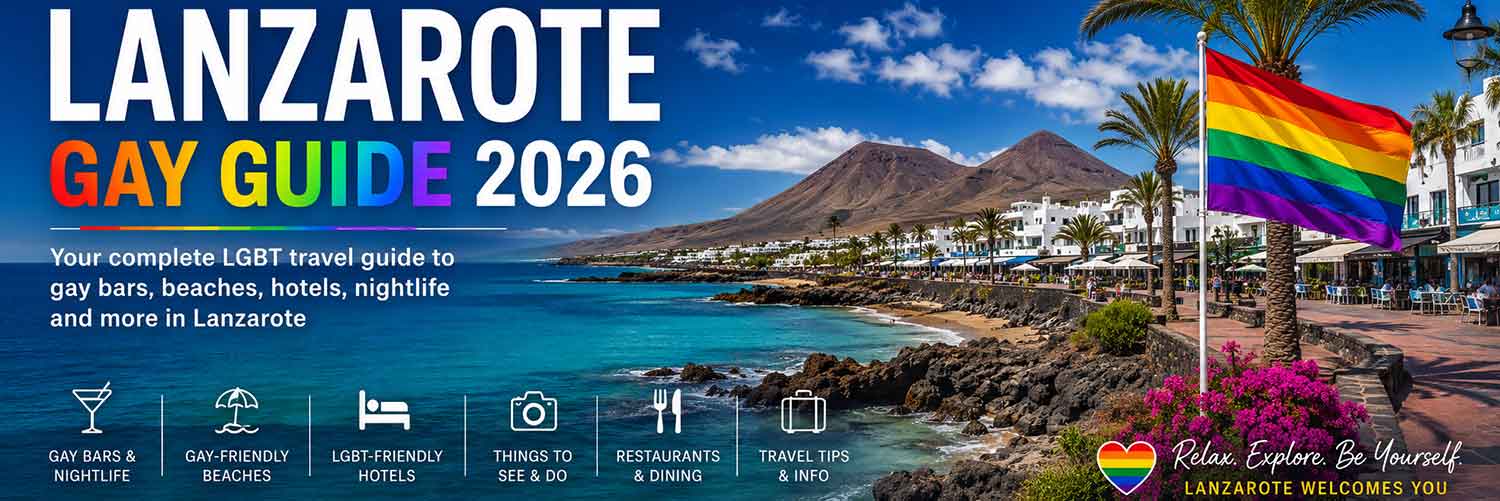 Puerto del Carmen waterfront in Lanzarote with rainbow flag, showcasing the island's LGBTQ+ friendly beaches, nightlife and holiday atmosphere.